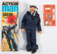 A Palitoy Action Man Sailor:, blonde flock hair and beard in uniform with HMS Ark Royal hat tallie,