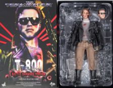 A Hot Toys 1/6th scale Terminator figure 'T-800 Battle Damaged Version':, boxed,