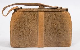 A Mappin & Webb retailed lizard skin handbag.