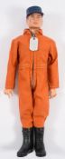 A Hasbro GI Joe painted hair Action Pilot:, cap, orange jump suit and black boots with dog tag.