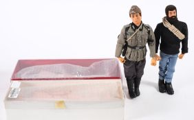 An Action Man flock hair Explorer and German Infantryman:,
