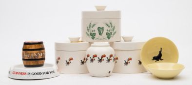 A Minton Guinness advertising ashtray together with two Carlton Ware Toucan pots and covers:,
