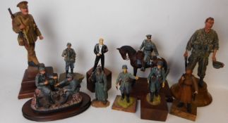 A collection of assorted hand painted resin and metal military mounted and foot figures: relating