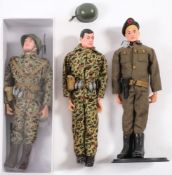 An Action Man painted hair Green Beret and two Commando figures:,