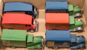 A group of six Tri-ang Minic clockwork delivery vans:,