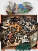 A collection of Britains diecast and later plastic zoo animals, including lions, giraffe,