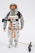 A Hasbro GI Joe Astronaut:, white plastic helmet with visor, foil suit and accessories.