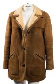 Two three quarter length leather jackets,: a lady's jacket, a cream suit and a sheepskin.