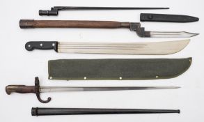 A WWI Gras bayonet together with a No 9 bayonet on a WWII entrenching tool:,