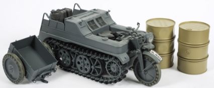 A Did Corp 1/6th scale WWII German Kettenrad and trailer:, together with two oil drums.