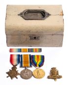 A WWI trio to '18411 Pte R.K.Beaven Wilts .R':, together with cap badge and ribbon bar.