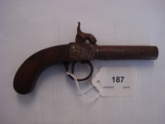 A mid 19th century percussion pocket pistol: with 7cm.