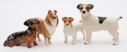 A group of four Beswick dogs:, comprising two Jack Russell,