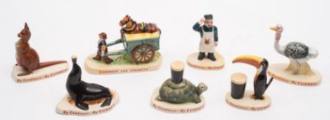 A set of seven Carlton Ware Guinness advertising figures:, Zoo Keeper, Toucan, Tortoise, Ostrich,