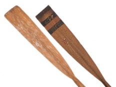 A pair of rowing oars with remains of honours to blades: (2)