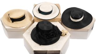 John Boyd, London, a black straw hat with silk band:, a cream felt hat also by John Boyd,