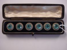 A set of six silver and aquamarine coloured paste buttons:,