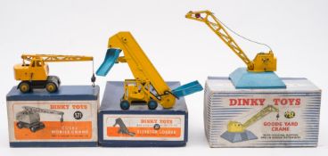 Dinky 571 'Coles' Mobiles Crane, together with 752 'Goods Yard Crane' and 564 'Elevator Loader':,