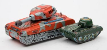 A Chinese tinplate clock work tank together with a smaller Chinese tinplate friction drive tank:,