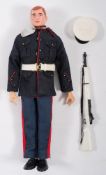 A Hasbro GI Joe painted head Marine:, with rifle and tag.