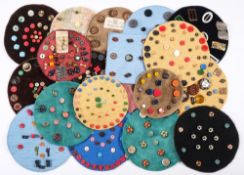 A collection of various buttons:, 1920's, 30's and onwards, mounted on nineteen mats.