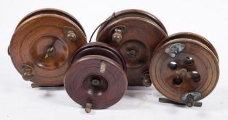 A mahogany and brass 6 inch star back reel by Sun:,