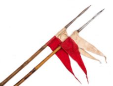 A pair of Cavalry lances:, steel tipped with red/white pennants,