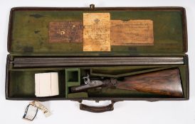 A cased 12-bore double barrel pinfire shot gun by Westley Richards, London:,