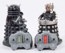 A battery operated remote control Dr Who 'Davros' figure and similar 'Dalek' figure: (2).