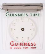 A Guinness wall clock:,