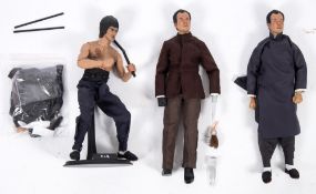 A loose 1/6th scale figure of Bruce Lee from the feature film 'Enter The Dragon':,
