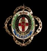 A 19th century gilt metal and enamel copy of the Florence Nightingale jewel: the centre with cross