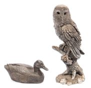 A filled silver model of a Barn Owl:, 21cm high,
