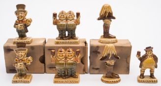 A set of seven Wade Guinness advertising figures:, comprising a set of four, Wellington, Mad Hatter,