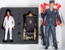 A Blitzway 1/6th scale Scarface figure 'Tony Montana' and a Neca 18 inch 'Scarface' figure:,