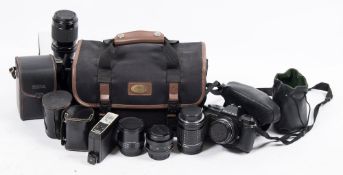 A Pentax P30n 35mm camera:, number 5016145 with 50mml lens, together with a 135 mm lens,