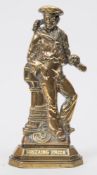 A brass 'Britain's Pride' doorstop:,