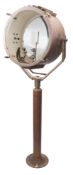 A large copper and brass ship's searchlight:,