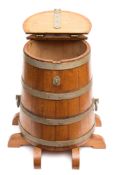 An oak and bound ship's salt beef storage barrel:, of conical form, hasp and clasp to cover,