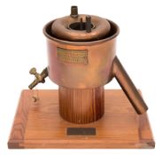 A copper and brass presentation model of Sir Boverton Redwood's Viscometer No 3189 by Baird &