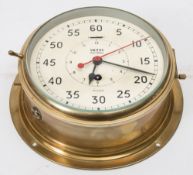 A brass cased bulkhead 'Astral' clock by Smiths:,