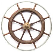 The teak and brass ship's wheel from the Royal Navy MFV Yarmouth Navigator:,