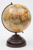 A 'Geographia' 8 inch Terrestrial Globe:, with Railways and Steamer routes and Commonwealth Nations,