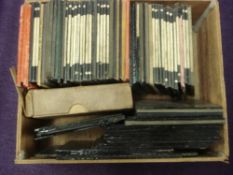 A collection of glass plate negatives and diapositive lantern slides of microscope specimens and