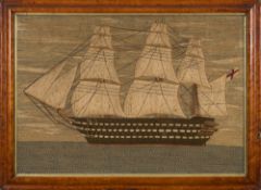 A 19th century woolwork of a ship of the line, titled to verso 'HMS Agamemnon' :,