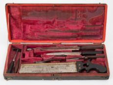 A 19th century part field surgical kit by Evans & Co,London:, including an ebony handled bone saw,