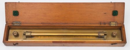 A cased brass rolling rule by J Halden & Co, London:, inscribed 'A D Lumb', the case 5 x 48 x 8.