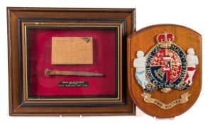 HMS Victory, a section of oak and an iron deck spike:, mounted with plaque numbered 79 of 95,
