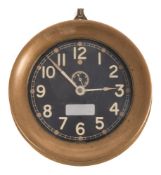 An American brass cased circular bulkhead clock by Chelsea Clock Co, Boston USA:,