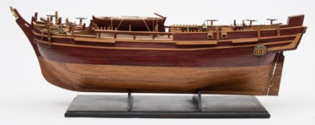 A builder's style scale model of a frigate:, the deck with lifeboat ,